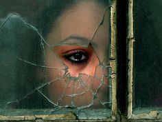 Girl's Eye In Window